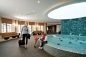 Preview: Gabion wall in hotel foyer, with glass rocks | chunks turquoise