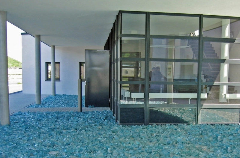 Commercial building, entrance area designed with glass rocks | chunks turquoise