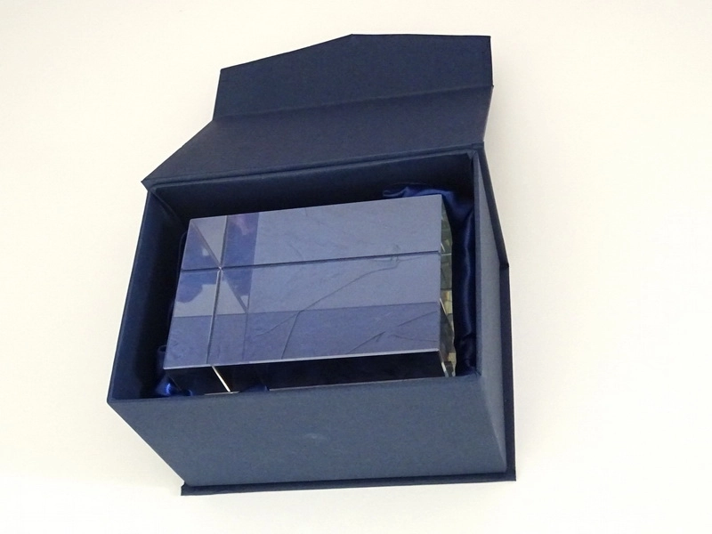 glass cuboid in dark blue gift box packaging